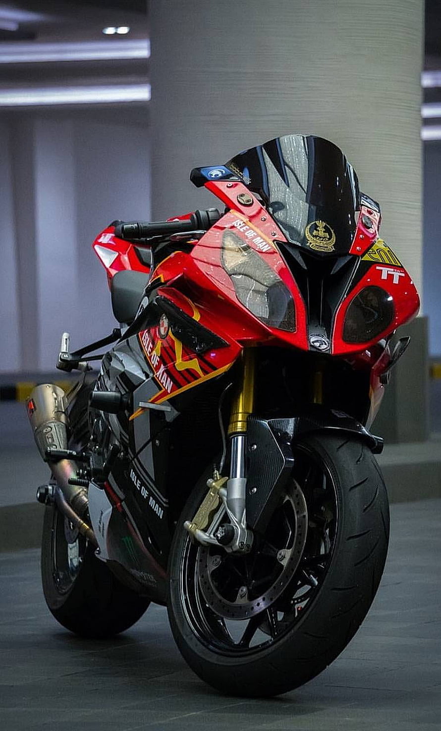 Red BMW S1000RR Superbike with Isle of Man Livery in Indoor Garage HD phone wallpaper