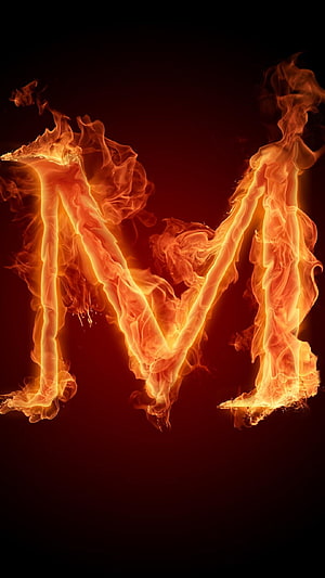 Burning Letter M in Vivid Orange Flames on a Dark Background HD phone wallpaper