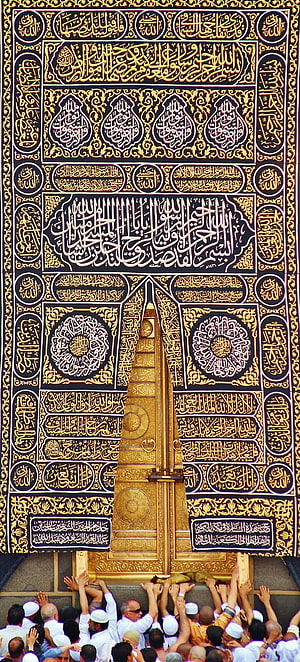 Kaaba Door with Intricate Gold Calligraphy and Pilgrims Reaching Toward the Sacred Entrance HD phone wallpaper