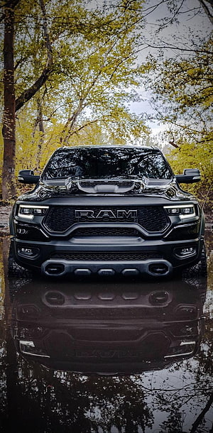 Black Ram TRX Front View Parked in Forest Water Reflection HD phone wallpaper