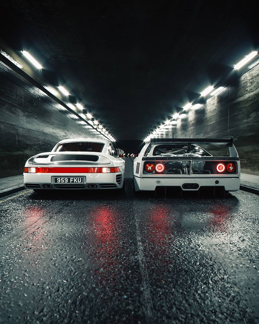 Rear View of White Ferrari F40 and Porsche 959 Super Cars in a Dark Tunnel HD phone wallpaper