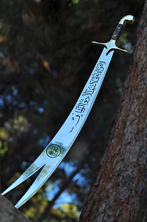 Zulfiqar Sword with Arabic Calligraphy Engraving and Split Blade Design HD phone wallpaper