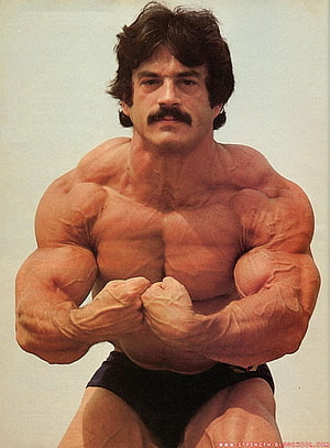 Mike Mentzer Vintage Bodybuilding Pose with Defined Musculature and Classic Mustache HD phone wallpaper