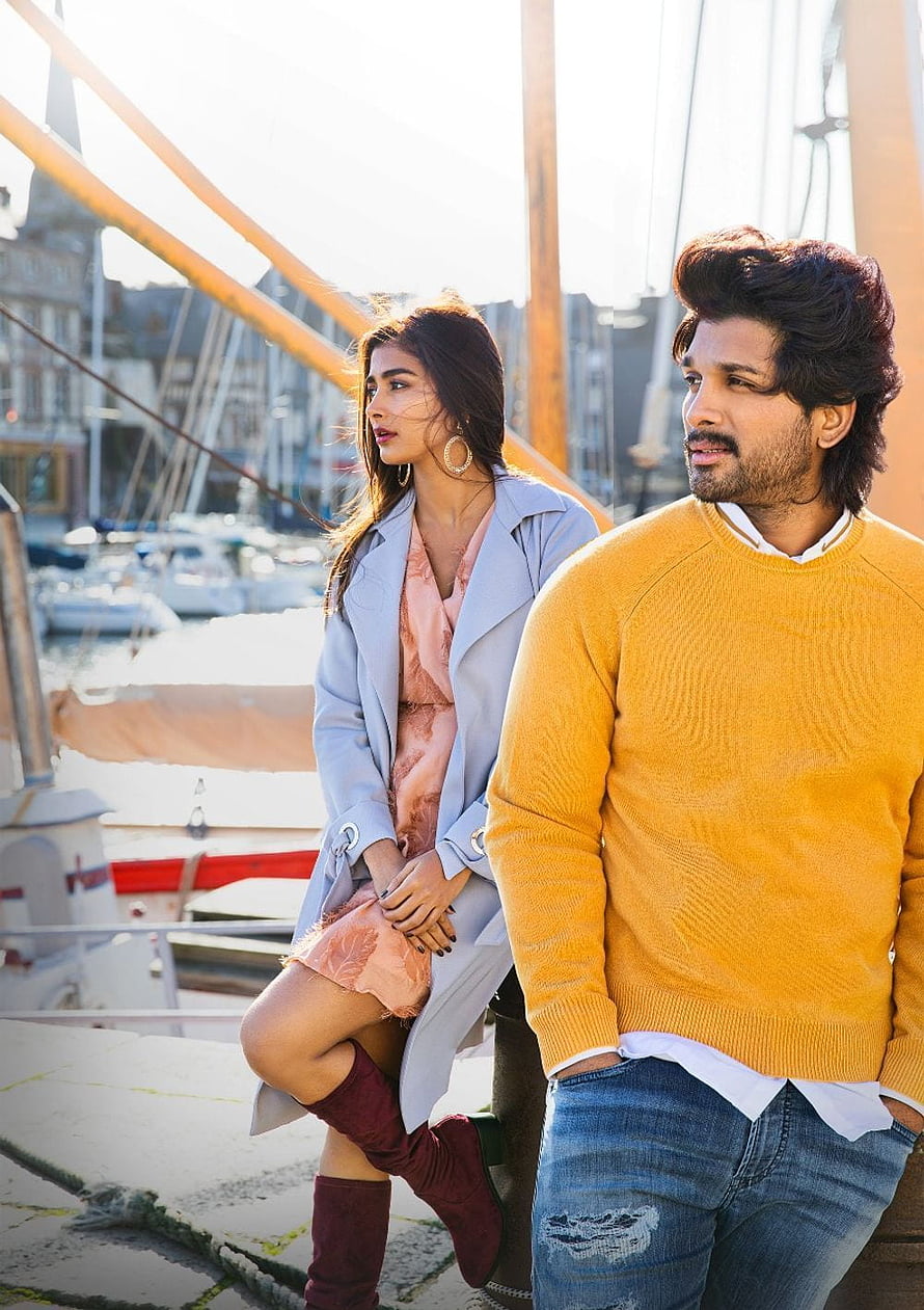 Allu Arjun and Pooja Hegde in stylish outfits at a European harbor HD phone wallpaper