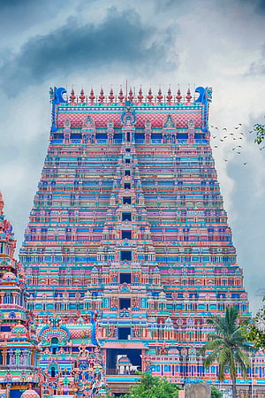Vibrant Gopuram Tower of a Tamil Hindu Temple in India Under Dramatic Sky HD phone wallpaper