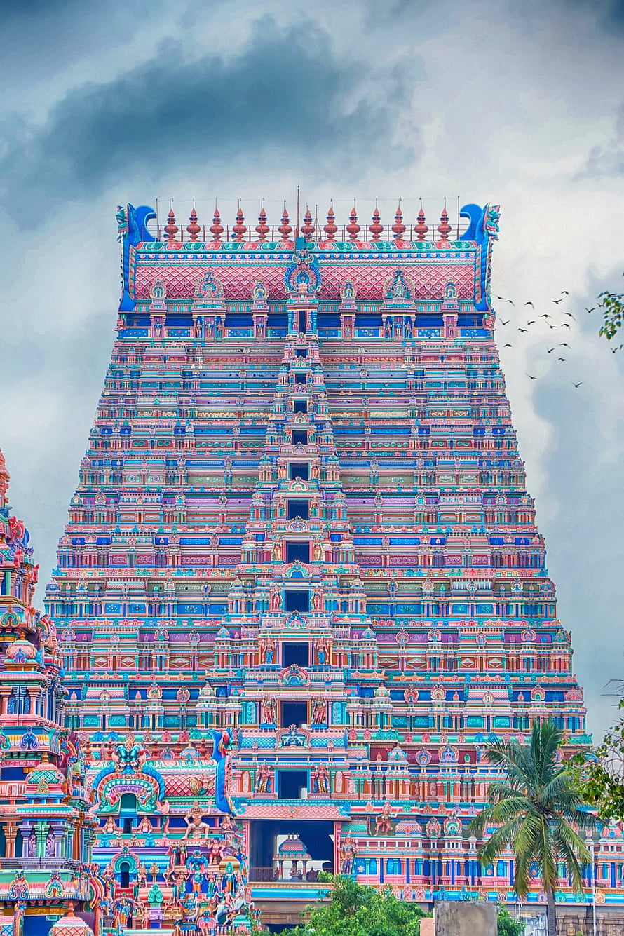 Vibrant Gopuram Tower of a Tamil Hindu Temple in India Under Dramatic Sky HD phone wallpaper