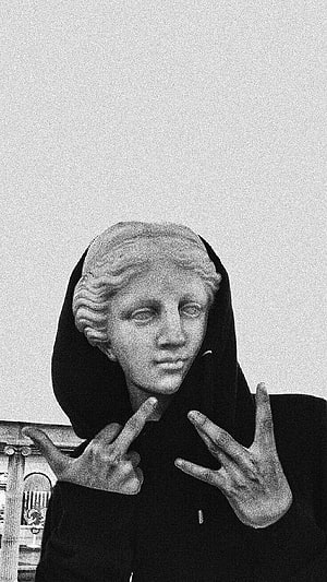 Black and White Portrait of Classical Statue Head with Peace Sign Hand Gestures HD phone wallpaper