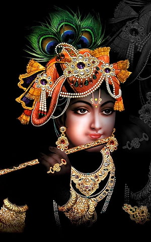 Lord Krishna Portrait with Peacock Feather Crown and Ornate Gold Jewelry on Black Background HD phone wallpaper