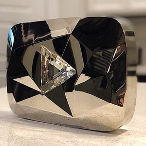 Gavin Black Diamond Play Button Championship Ring with Triangular Gemstone HD wallpaper