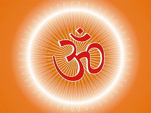 Glowing Om Symbol with Radiant Sunburst Rays on Warm Orange Background HD wallpaper