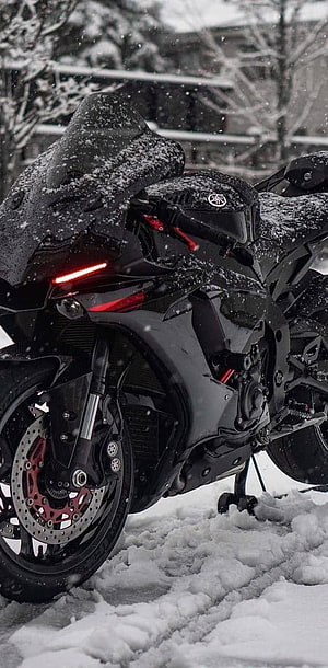 Black Yamaha R1M Superbike Parked in Snow with Red Brake Calipers HD phone wallpaper