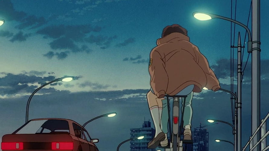 Whisper of the Heart Anime Scene: Girl Riding Bicycle at Dusk in City HD wallpaper
