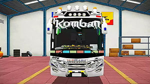 Komban Tourist Bus Livery Front View in Garage HD wallpaper