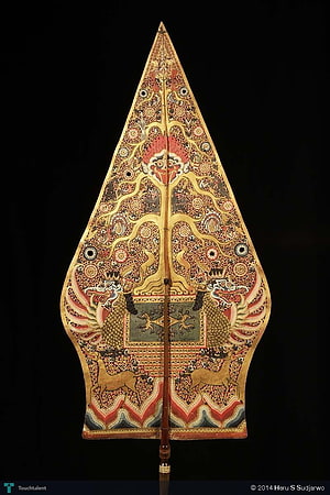Ornate Javanese Royal Fan with Mythical Garuda and Deer Motifs HD phone wallpaper