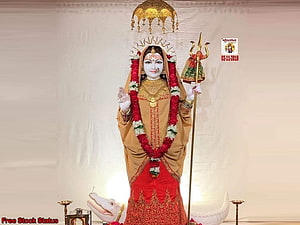 Khodiyar Maa Deity Statue with Trident and Serpent Base in Traditional Attire HD wallpaper
