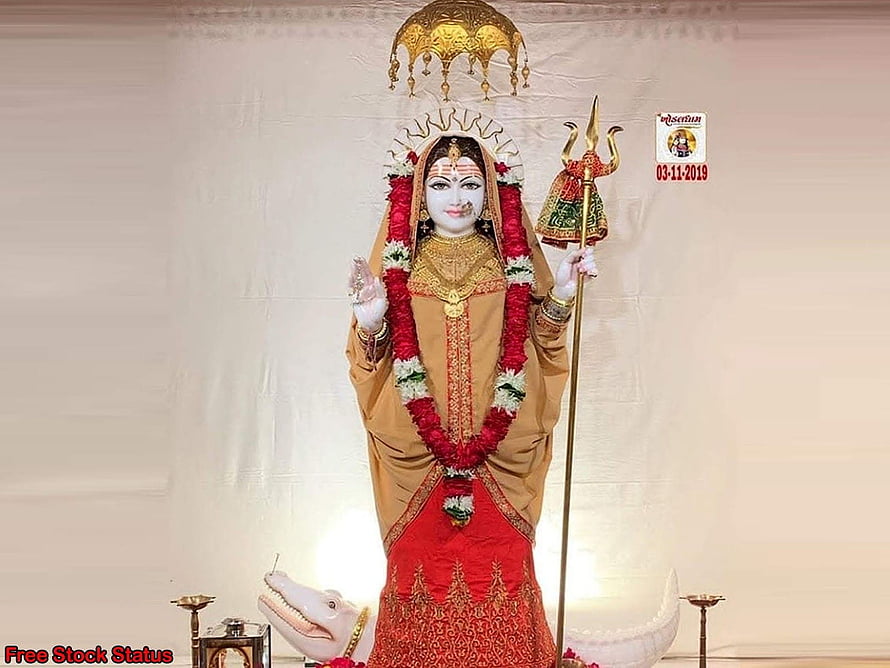 Khodiyar Maa Deity Statue with Trident and Serpent Base in Traditional Attire HD wallpaper