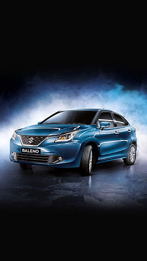 Suzuki Baleno Blue Hatchback in Dramatic Studio Lighting with Smoke Effects HD phone wallpaper