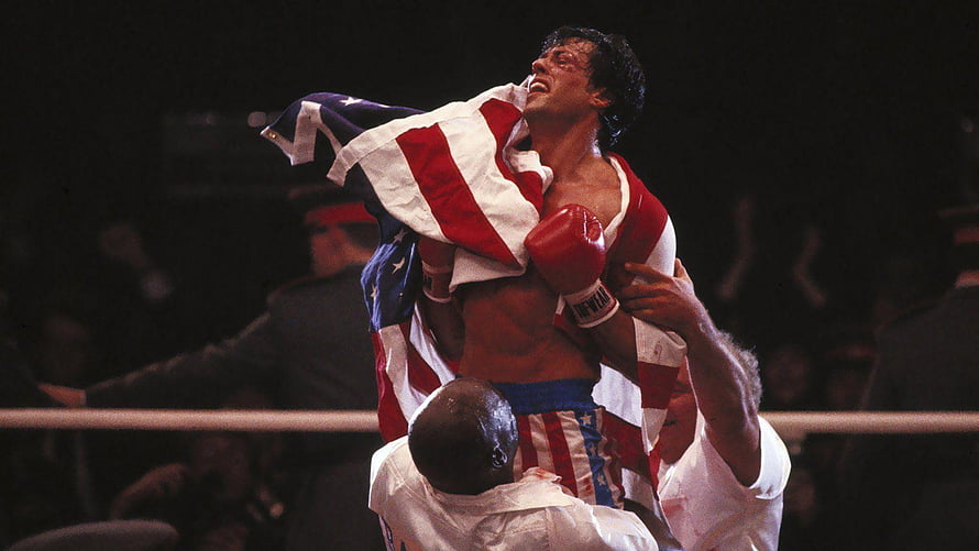Rocky IV Victory Scene with American Flag in Boxing Ring HD wallpaper