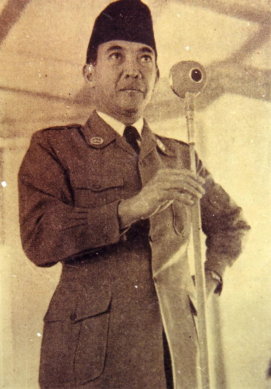Historical Portrait of Ir. Soekarno in Military Uniform Holding a Ceremonial Staff HD phone wallpaper