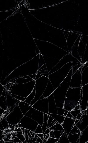 Shattered Glass Texture on Black Background with Intricate Crack Patterns HD phone wallpaper