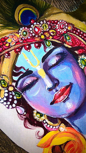 Vibrant Krishna Portrait with Ornate Jeweled Crown and Peacock Feather HD phone wallpaper