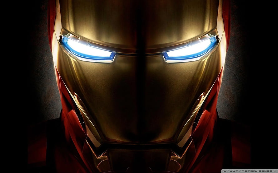 Iron Man Close-Up Portrait with Glowing Blue Eyes and Gold Armor HD wallpaper