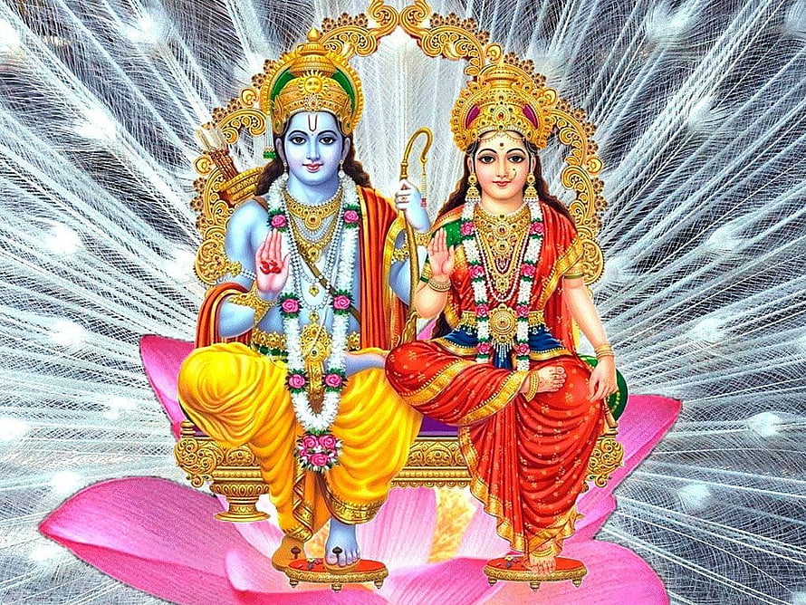 Ram and Sita Seated on a Lotus Throne with Golden Halos and Floral Garlands HD wallpaper