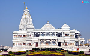 Prem Mandir Temple in Vrindavan with White Marble Architecture and Golden Spires HD wallpaper