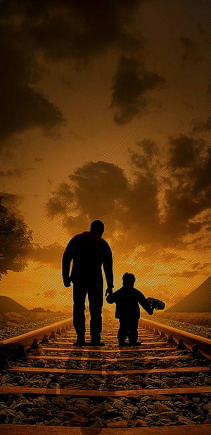 Silhouette of a father and child walking hand in hand along railway tracks at sunset HD phone wallpaper