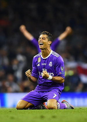 Cristiano Ronaldo Celebrating in Real Madrid Purple Kit on the Pitch HD phone wallpaper