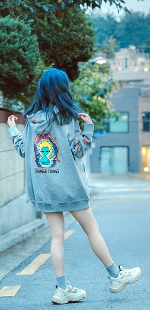 IU in Blue Hair Wearing Stranger Things Hoodie on a Street HD phone wallpaper