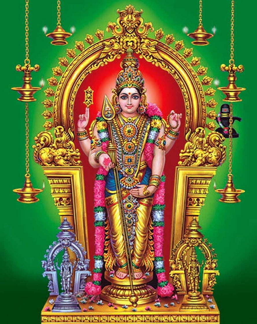 Murugan deity statue adorned with garlands and holding a vel in a golden temple shrine HD phone wallpaper