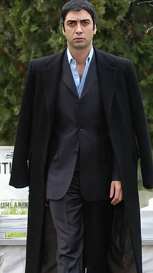 Polat Alemdar from Kurtlar Vadisi in a formal black overcoat and suit HD phone wallpaper