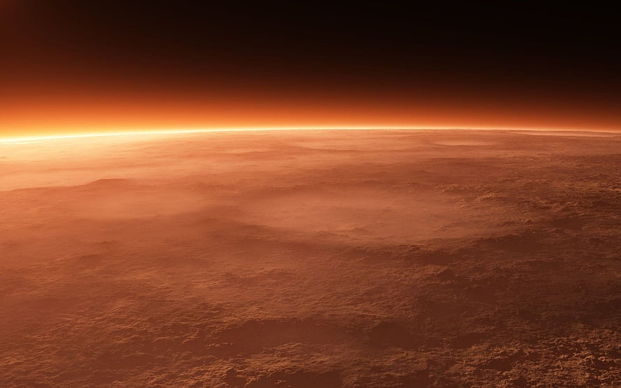 Mars Surface Horizon at Sunset with Atmospheric Glow and Rocky Terrain HD wallpaper