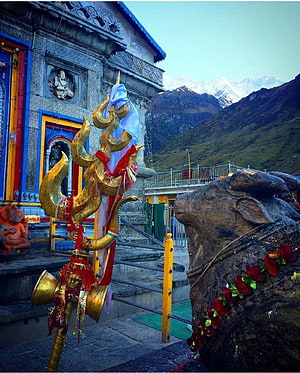 Golden Trishul and Nandi Statue at Himalayan Shiva Temple HD phone wallpaper