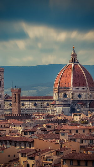 Florence Cathedral Dome and Historic Cityscape Under Dramatic Clouds HD phone wallpaper