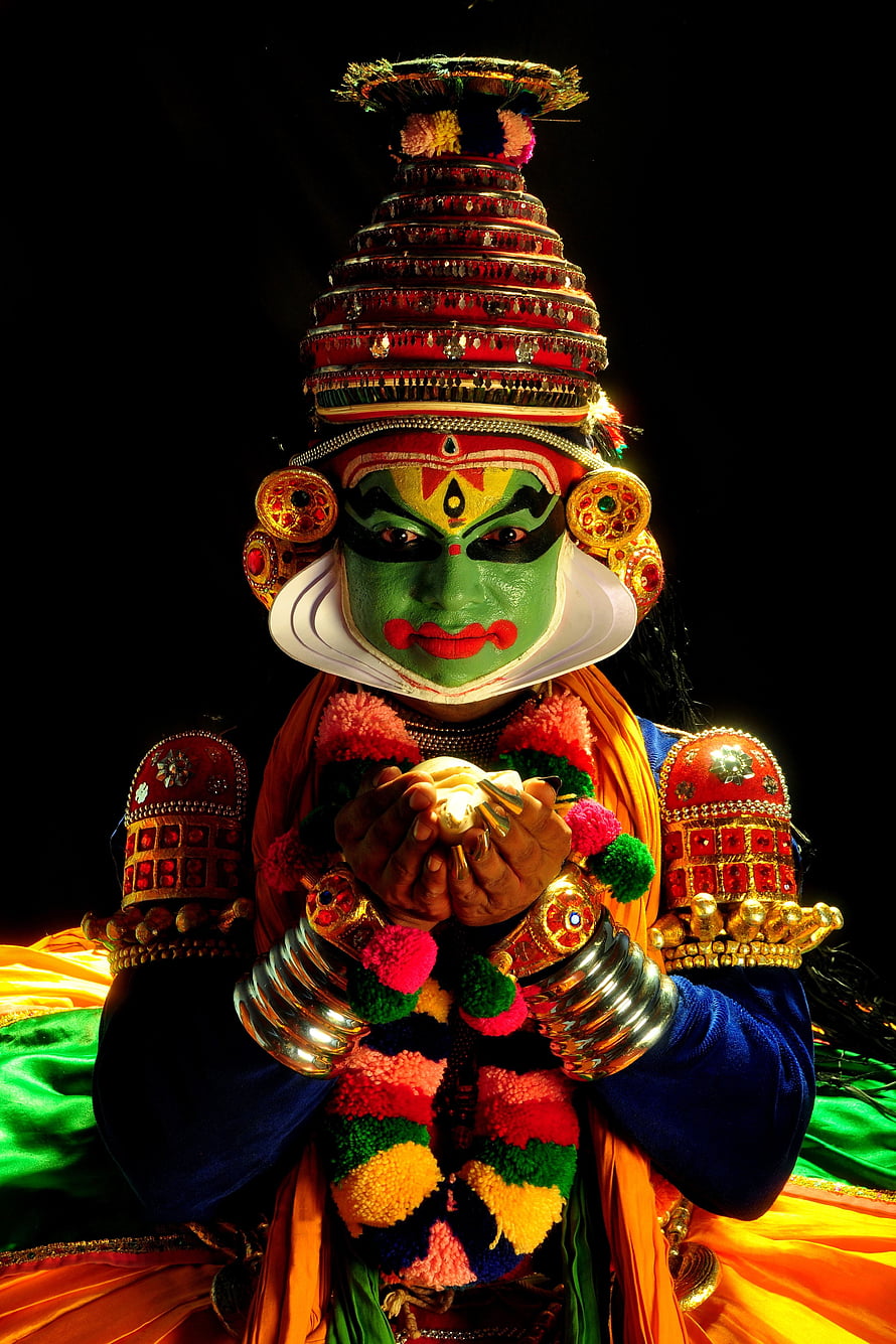Kathakali Performer in Traditional Kerala Dance Costume with Elaborate Green Face Paint HD phone wallpaper