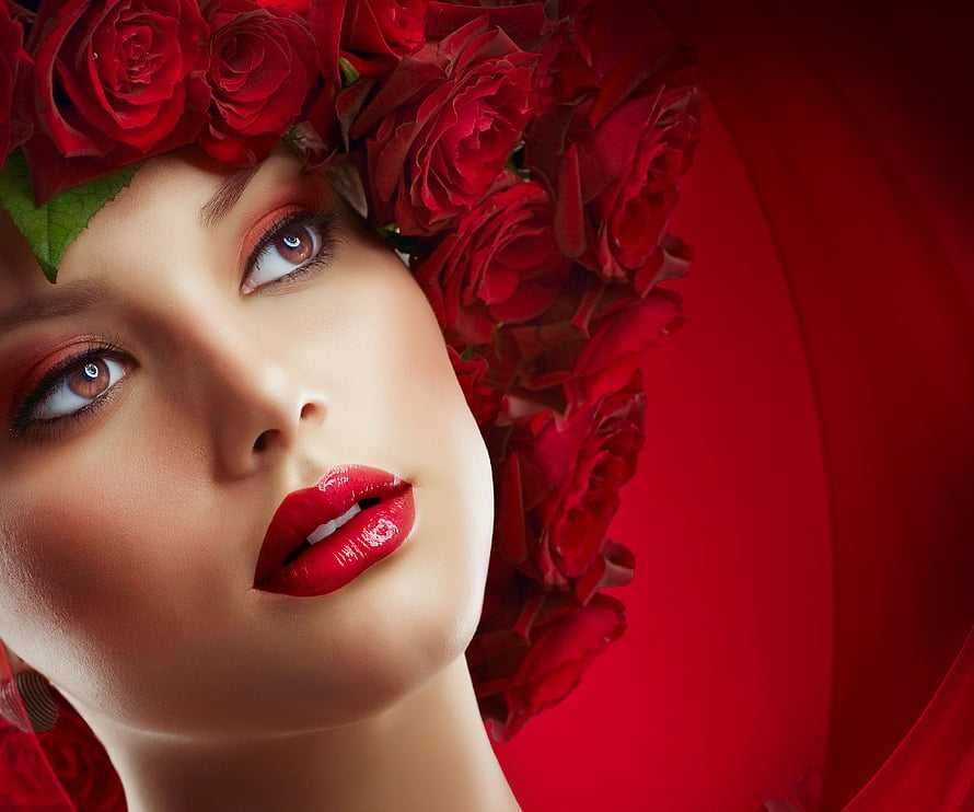 Elegant Beauty Portrait of a Woman Wearing a Crown of Red Roses with Bold Red Lipstick HD wallpaper
