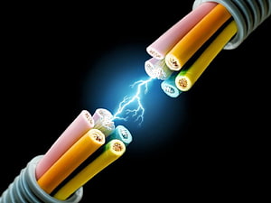 Electric Arc Between Exposed Multi-Core Cable Conductors on Black Background HD wallpaper