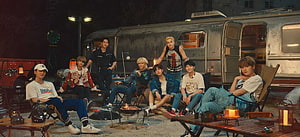 Stray Kids Group Photo Camping at Night with Vintage RV and Bonfire HD wallpaper