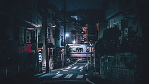 Moody Night Street in a Japanese Neighborhood with Train and Neon Lights HD wallpaper