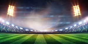 Illuminated Cricket Stadium at Night with Glowing Floodlights and Lush Green Pitch HD wallpaper