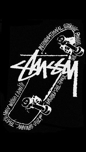 Stussy International Skateboard Graphic with Punk Rock Typography on Black Background HD phone wallpaper