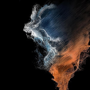 Samsung Galaxy S22 Abstract Particle Art with Blue and Orange Gradient on Black Background HD phone wallpaper