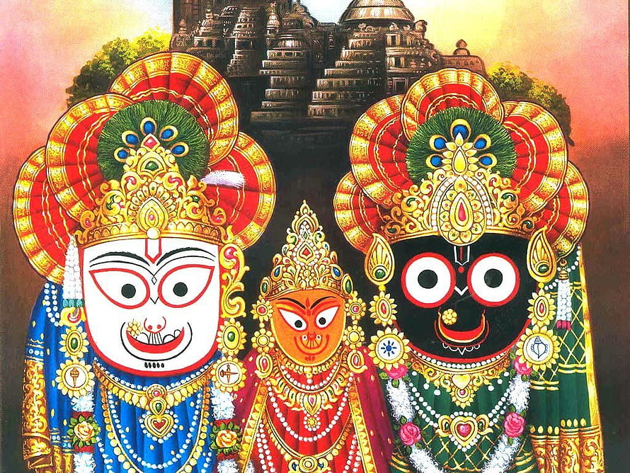 Jagannath, Balabhadra, and Subhadra deities in ornate traditional attire before a temple HD wallpaper