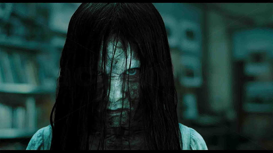 Terrifying Ghost Girl with Long Black Hair and Pale Face in Dark Horror Scene HD wallpaper