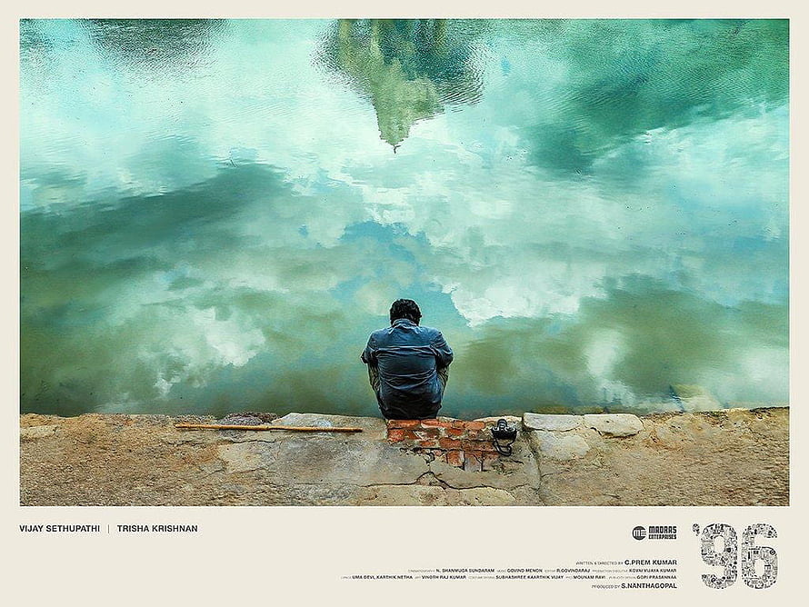 96 Movie Poster Featuring Man Sitting by Turquoise Water with Reflection HD wallpaper