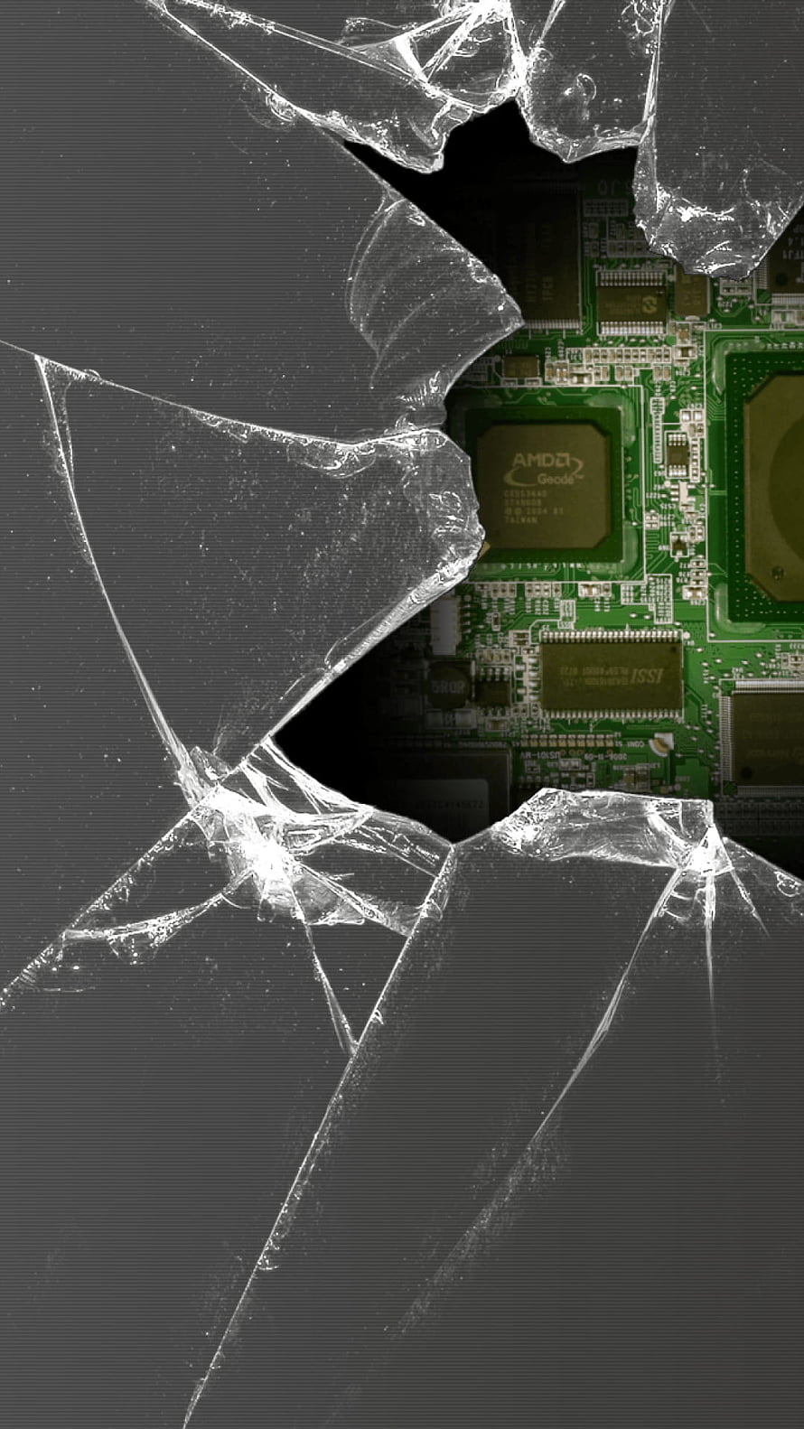 Shattered Glass Over Exposed Circuit Board with AMD Processor HD phone wallpaper