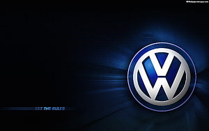 Volkswagen Logo on Dark Blue Carbon Fiber Background with Metallic Finish HD wallpaper