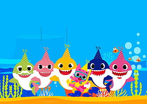 Baby Shark Family Wearing Party Hats in Colorful Underwater Scene HD wallpaper